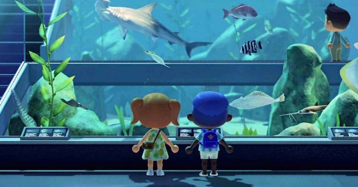 two virtual characters look at virtual aquarium